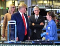 Image: White House senior adviser Ivanka Trump, left, President Trump and Apple CEO Tim Cook tour the Flex computer manufacturing facility in Austin, where Apple's Mac Pros are assembled, on Nov. 20, 2019. (Mandel Ngan/AFP/Getty Images)