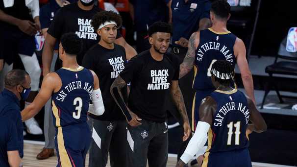 With the words on their backs, NBA players take a stand