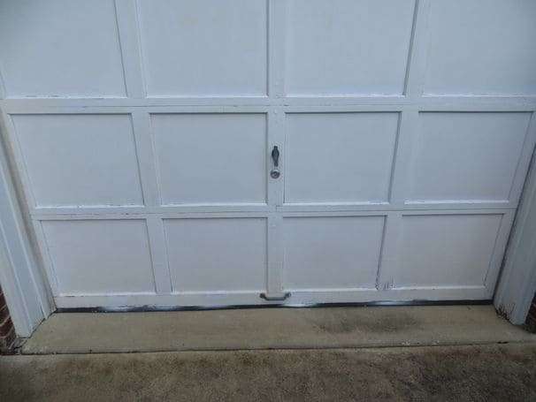 Do these garage doors need to be replaced — or just repainted?