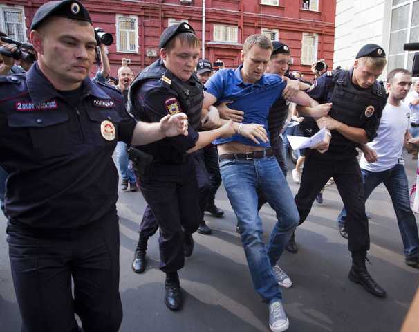 Trolls, tracking and films: How Putin’s Russia obsessively hounded opposition leader Navalny