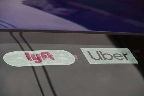 Uber and Lyft must make their drivers in California full employees, judge rules