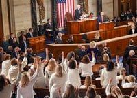 Image: Democratic female lawmakers wear suffragist white to President Trump's State of the Union address this year.