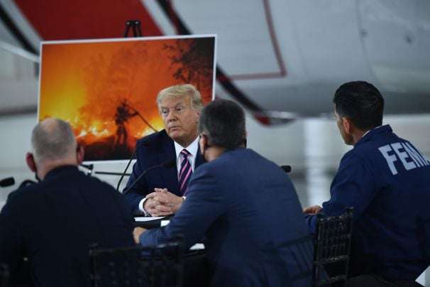 Devastating wildfires out West inject climate change into the presidential campaign