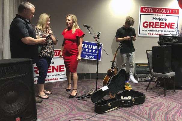 GOP candidate poses with rifle, says she’s targeting ‘socialist’ congresswomen