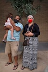 DAVIS, CA - SEPTEMBER 15:
Khadija Zridi, 32 and Mohamed Anouar Maskaoui, 42, moved to the States 4 years ago. When the pandemic started, Anouar lost his restaurant job and Khadija started working for DoorDash. The couple tag teams the work with their young daughter in tow. They make deliveries in Davis, Calif., on Tuesday, September 15, 2020. For the project “On their own: Amid the pandemic, a day in the life of American workers”
(Photo by Preston Gannaway/For The Washington Post) 
