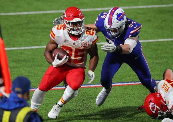 Chiefs show they’re more than just Patrick Mahomes, running to a soggy win over the Bills