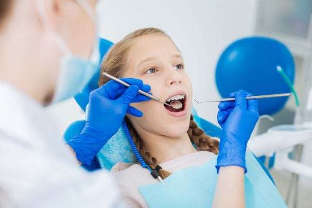 How do braces straighten your teeth?