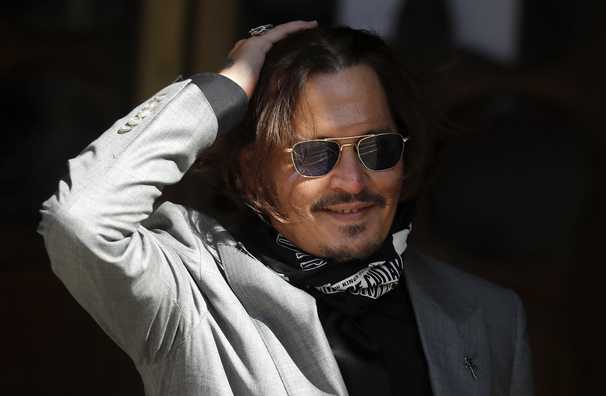Johnny Depp loses British libel case over article that called him a ‘wife beater’