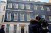 A TV cameraman at 11 Downing Street on March 27. (Tolga Akmen/AFP/Getty Images)
