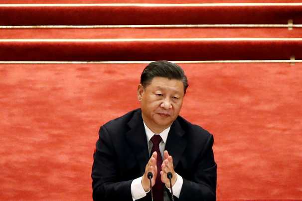 A year after coronavirus emerged in Wuhan, China’s Xi declares 2020 a triumph