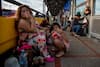 Rosa Gomez of Honduras and her family camp for hours along the Gateway International Bridge just across the line that separates Brownsville, Tex., from Mexico on June 23, 2018, in Matamoros, Mexico. 