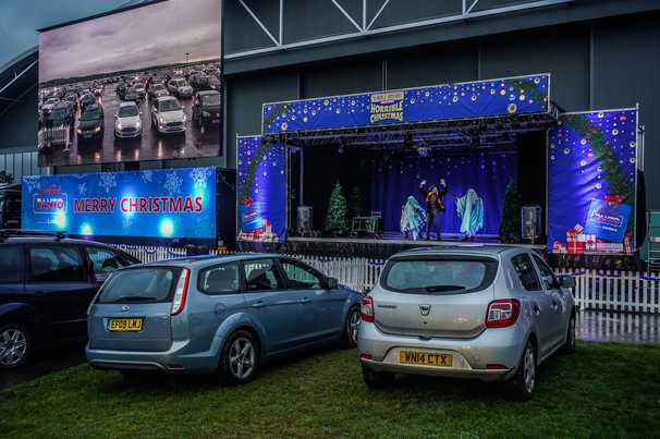 Britain’s holiday tradition of outrageous pantomime theater has a pandemic plot twist: Drive-in shows