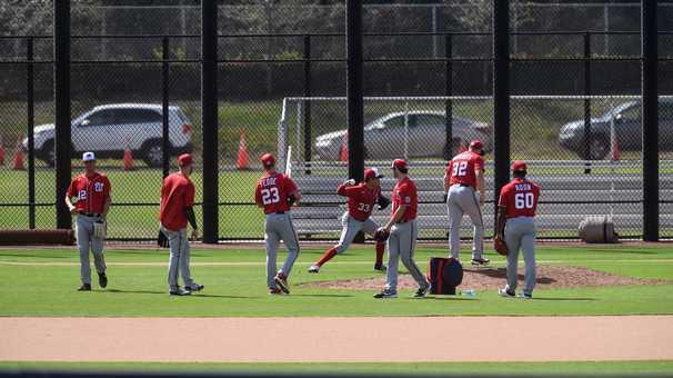The Nats can focus on baseball at spring training, but a reminder of the pandemic is nearby
