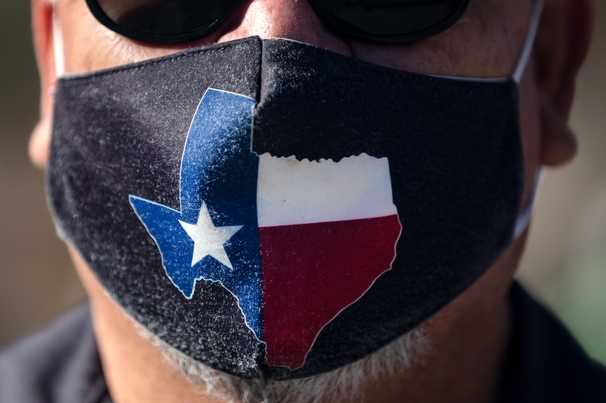Covid-19 live updates: Target, CVS among stores keeping mask mandates as Texas lifts restrictions