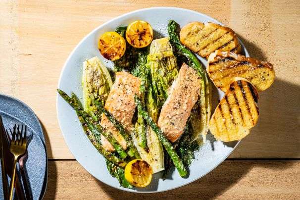 A garlicky, versatile vinaigrette is the key to this grilled salmon Caesar salad