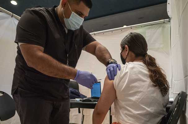 Covid-19 live updates: Most Americans who haven’t gotten a vaccine say they don’t plan to, poll shows