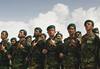 KABUL, 2006 | New Afghan army recruits stand at attention during a graduation ceremony at the Afghan National Army base.