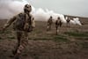 KAJAKI, 2007 | British marines run toward a Taliban position.
