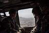KABUL, 2017 | U.S. service members deployed for Mission Resolute Support ride in a helicopter over Kabul. 