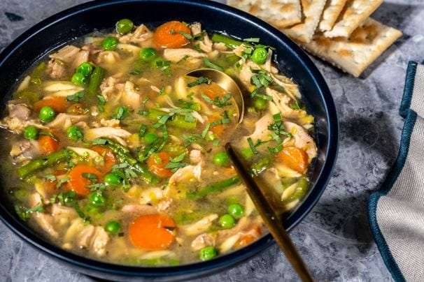 A chicken and orzo soup that’s fresh enough for spring, with leeks, peas and asparagus
