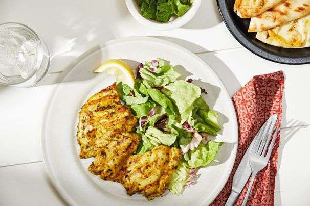 A tandoori-style marinade leads to boldly seasoned, moist and tender grilled chicken