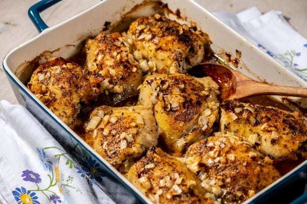 Baked chicken thighs with butter and onions are an ode to a childhood spent cooking with Mom
