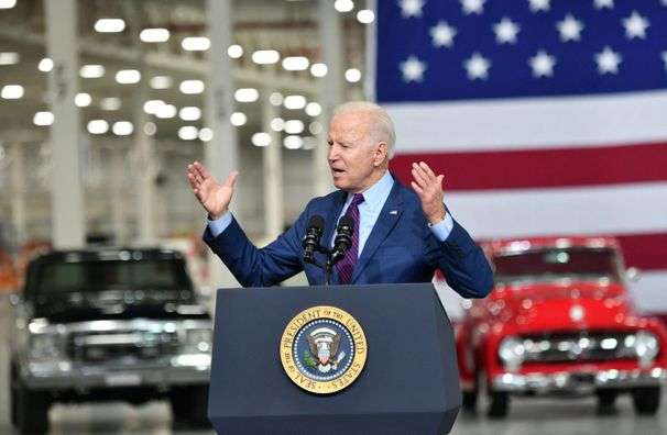 Biden says U.S. is in race with China to build electric cars as he pitches infrastructure plans