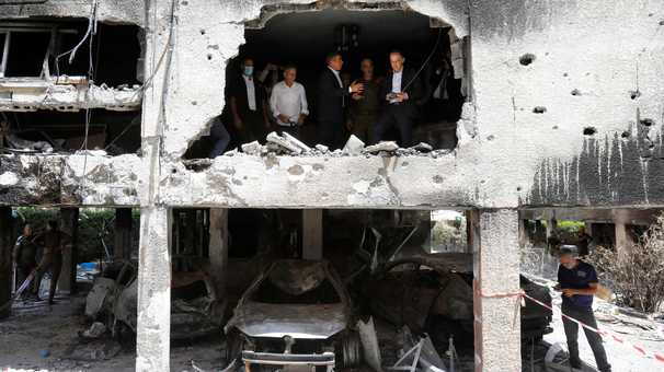 Cease-fire aimed at ending 11 days of fighting between Israel and Hamas takes effect