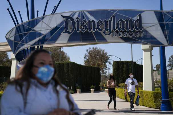 Disney, hit hard by the pandemic, signals its belief that bright days are imminent