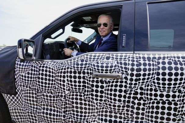 ‘I’m a car guy’: Biden zips around in electric Ford truck to boost clean-energy agenda