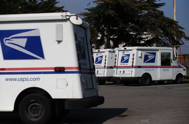 Push to electrify mail trucks gains wide support, an unlikely win for both DeJoy and Biden