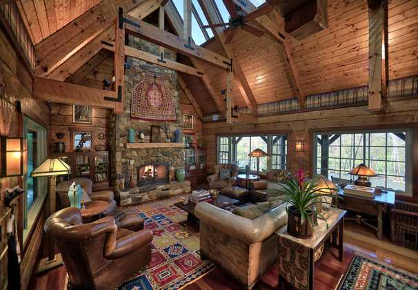 The owner wanted a log house on the water. He got that and more.