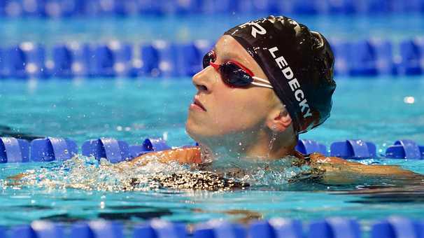 Katie Ledecky will pull double duty on her busiest night of the Olympic trials