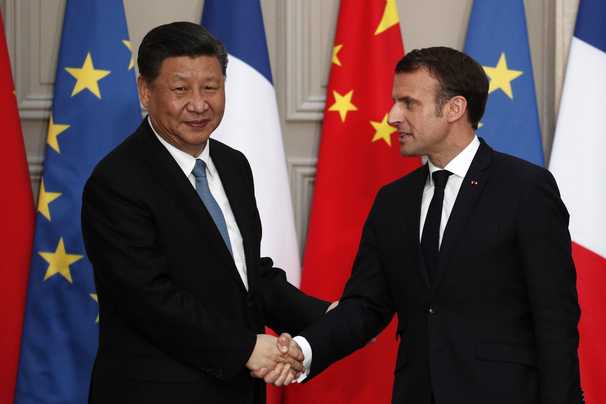 China says Macron and Merkel support reviving E.U.-China investment pact. Not so fast.