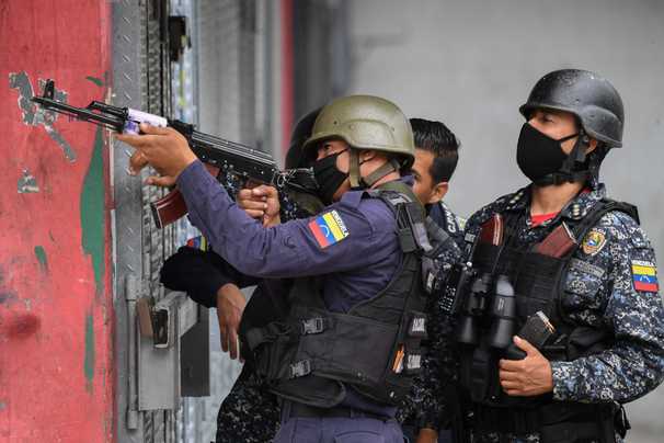 Deadly standoff in Venezuela leaves over 20 dead, officials say, in latest escalation of gang violence