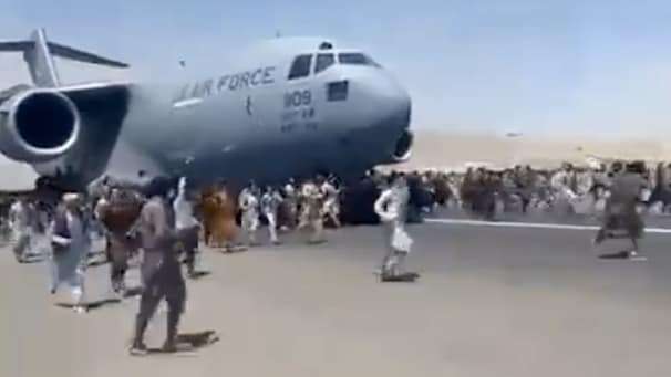 Scenes of deadly chaos unfold at Kabul airport after Taliban’s return
