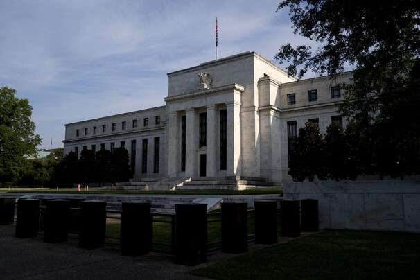 Weighing inflation and the labor market, Fed debates when to scale back support for the markets