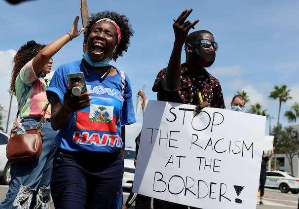 Charges of racism swirl as Haitian Americans, allies unite to protest Biden’s border crisis