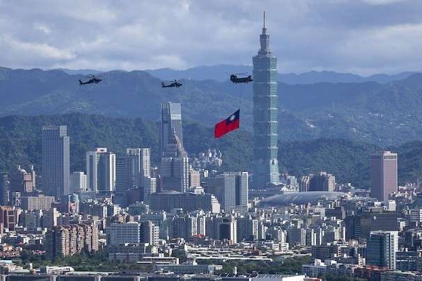 China warns United States over news reports that American forces are stationed in Taiwan