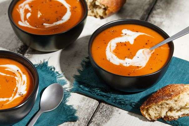 Creamy tomato pumpkin soup turns to warming Caribbean flavors for an extra dose of comfort
