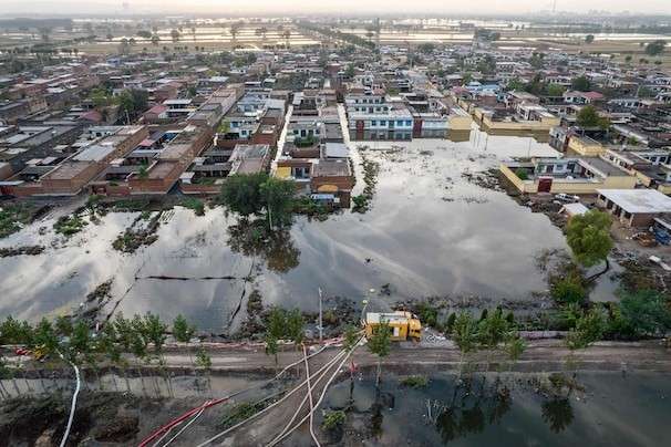 Mass floods hit China’s coal hub, threatening power supplies