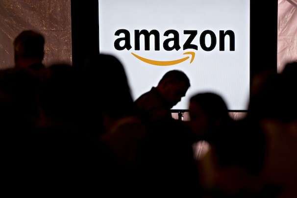 Amazon to increase base pay cap for employees as it competes for workers