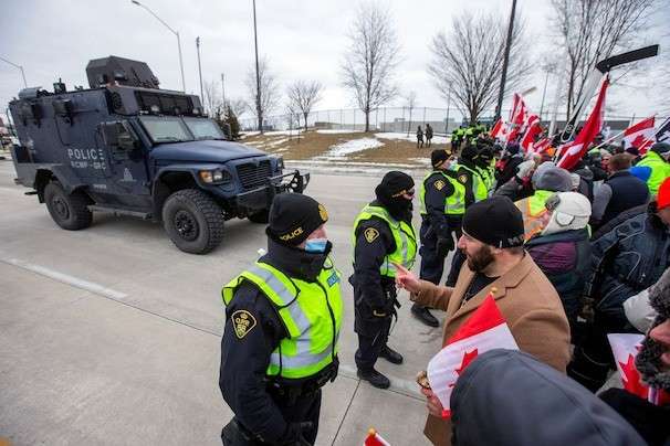 Police clear ‘Freedom Convoy’ protesters from key U.S.-Canada border crossing, but it has still not reopened