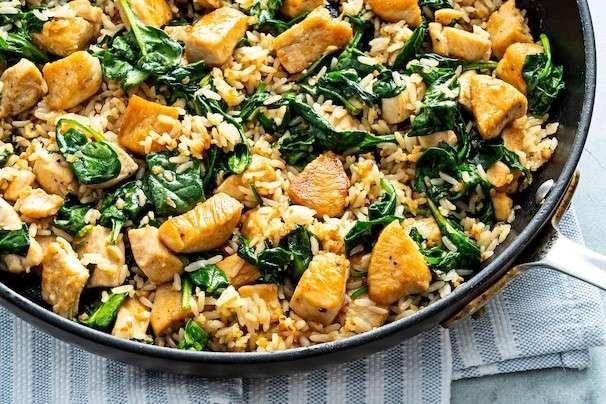 Skillet chicken and rice goes bold with a whole head of garlic