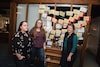 From left, Sheridan Press publisher Kristen Czaban, public safety reporter Margaret O'Hara and managing editor Ashleigh Snoozy with a collection of the paper's awards. All three have investigated registered agents. 