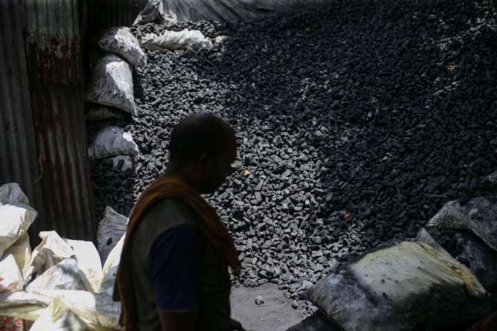 Facing a power crisis and searing heat, India falls back on coal