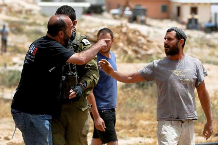 Israel infighting could strip legal protections from West Bank settlers