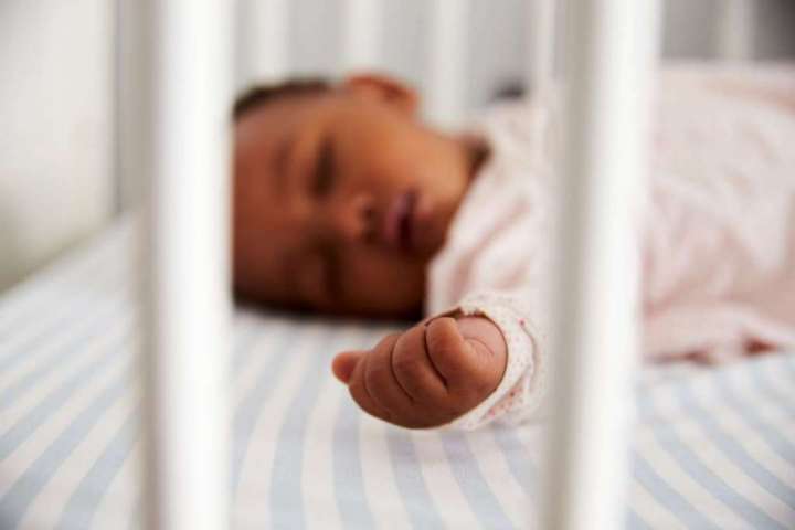 New safe sleep guidelines for babies include flat beds and no bed-sharing