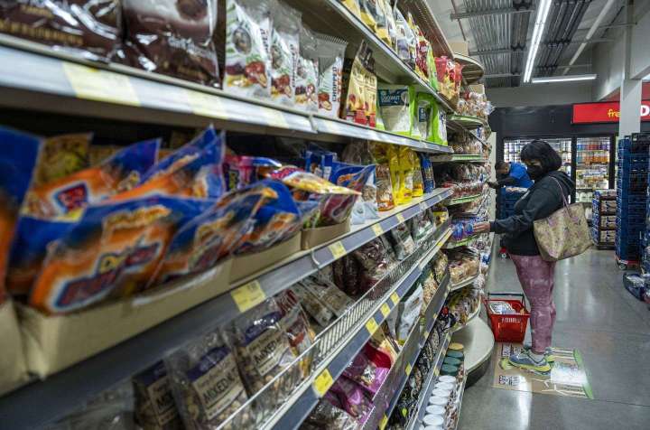 Consumer spending surged in June amid higher fuel, food costs