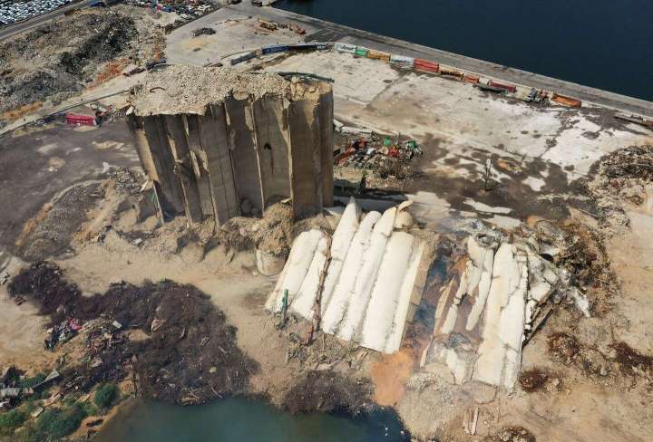 Beirut’s burning grain silos finally fall after weeks of inaction
